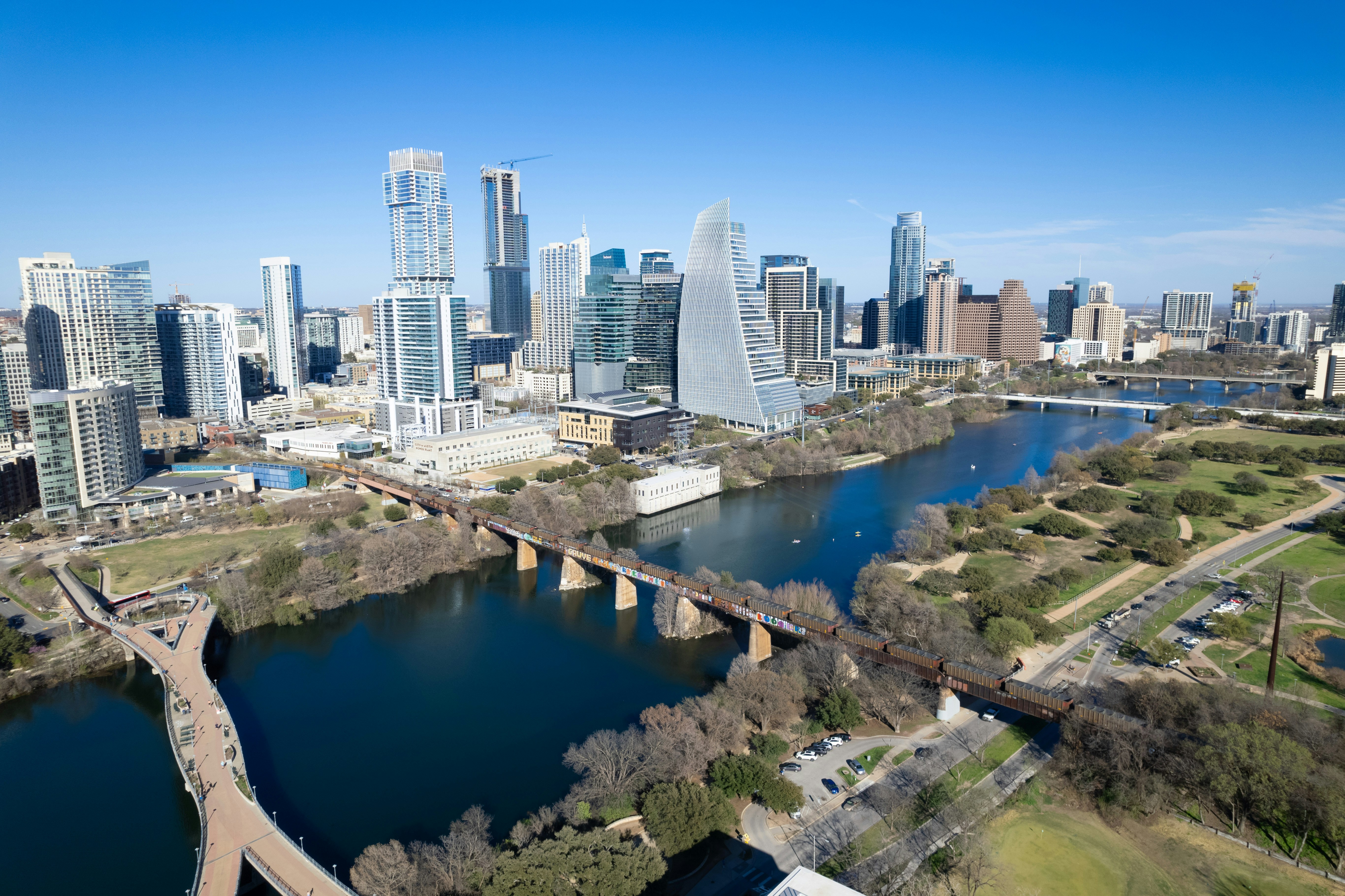 an aerial view of a city and a river